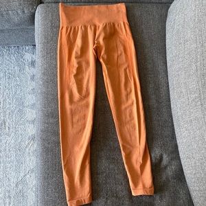 NVGTN orange leggings